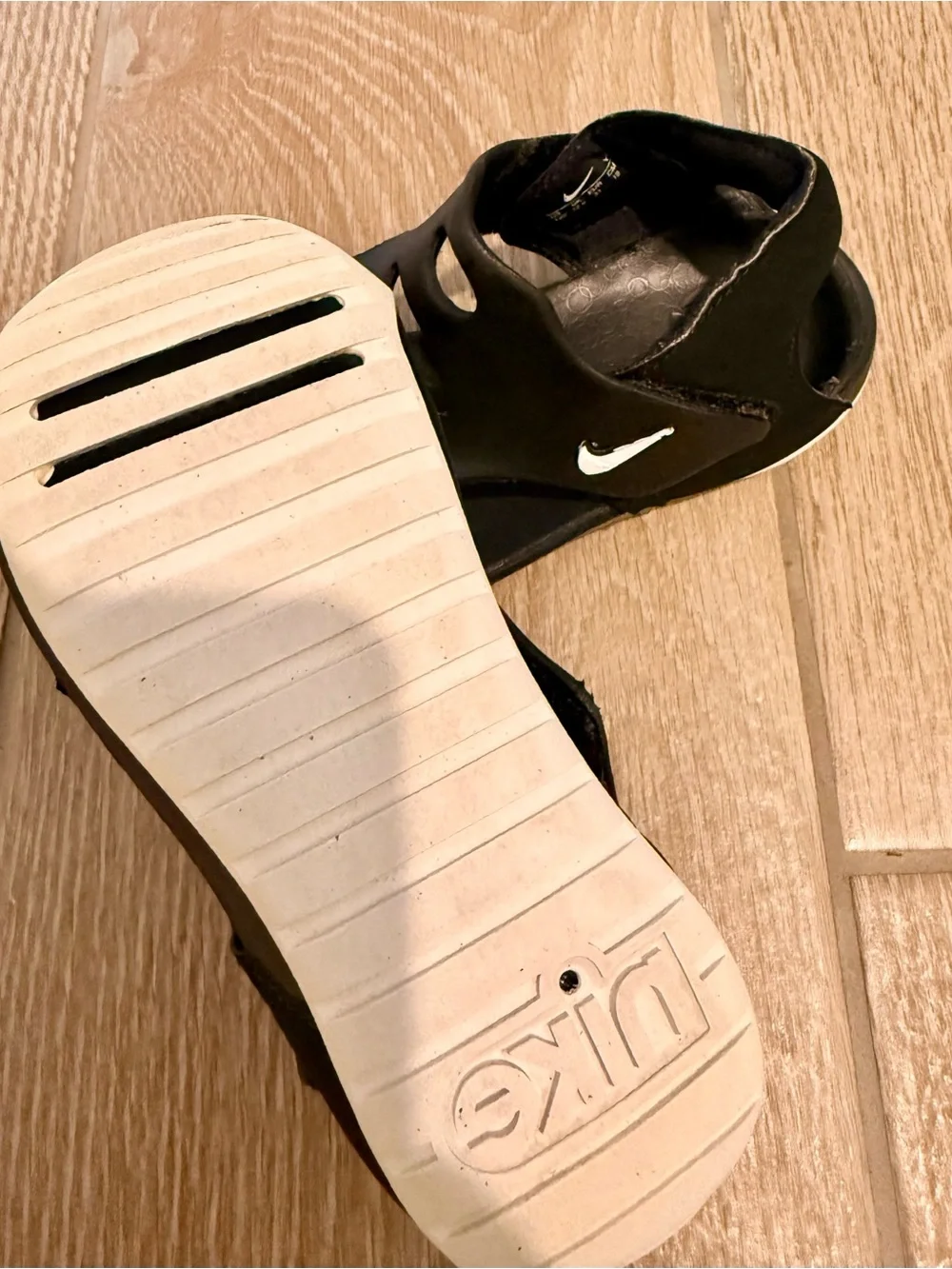 Nike Black Youth Sandals with White Swoosh Accent